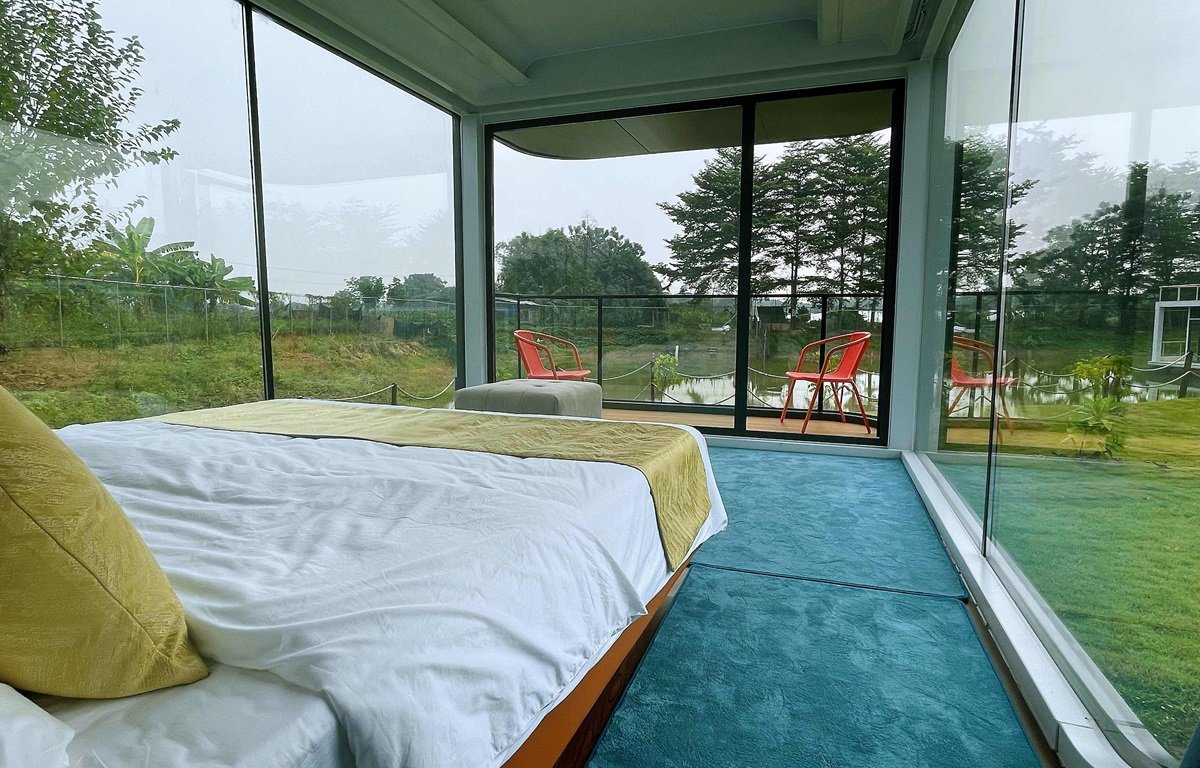 Casa Cápsula E7 con 2 camas, 1 baño y balcón